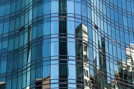 Reflected details on a glass building in Manhattan, New York City thumbnail