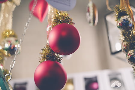 two red Christmas baubles thumbnail