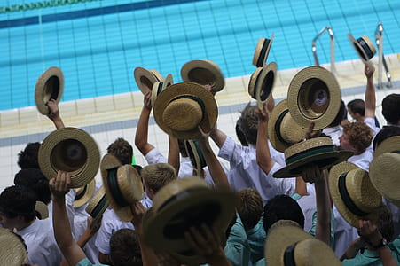 people raising hats thumbnail