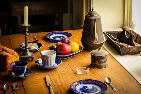 close-up photography of white ceramic plate arrangement on table thumbnail