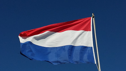 red, white, and blue stripe flag low-angle photography thumbnail