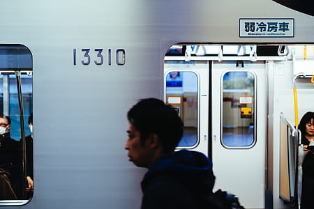 man walking on train thumbnail