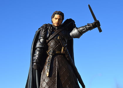 man holding sword statue thumbnail