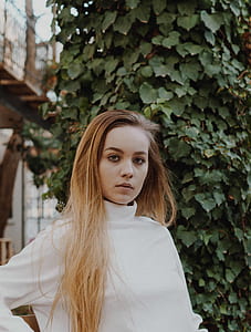 woman standing in front of tree thumbnail