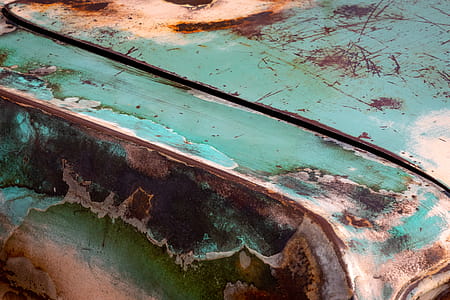 Blue and Beige Vehicle Hood Photography thumbnail