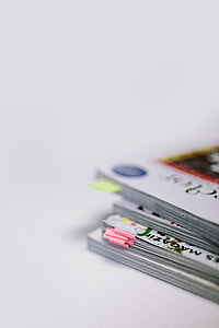 Stack of white magazines with copy space thumbnail