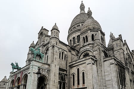 The Sacre Coeur rises from the hilltop in Paris, France. thumbnail