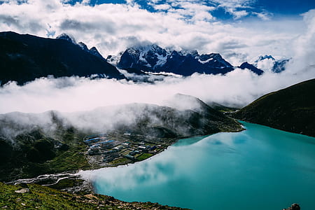 fog covered mountains during daytime thumbnail