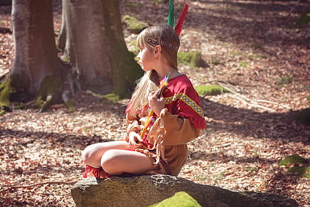 girl sitting on gray rock thumbnail