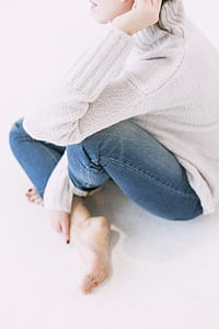 Woman in Gray Sweater and Blue Denim Jeans thumbnail