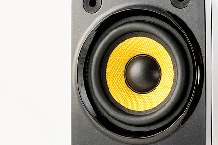 close-up photography of black and yellow speaker thumbnail