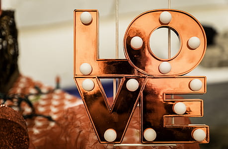 shallow focus photography of love LED lights thumbnail