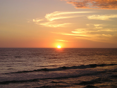 calm sea water during golden hour thumbnail