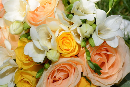 photo of peach-colored roses and white petaled flowers thumbnail