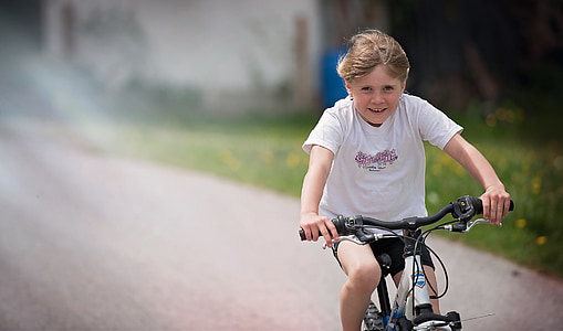 girl riding bike thumbnail
