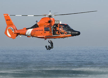 orange rescue helicopter while person about to dive thumbnail