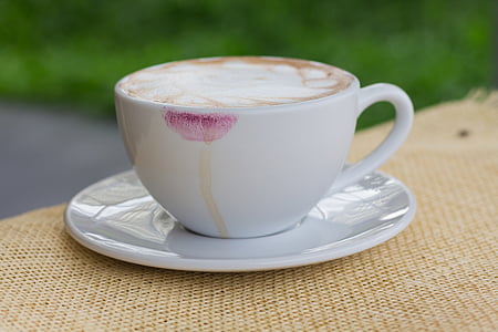 selective focus photography of white ceramic cup with cappuccino thumbnail