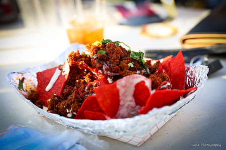 Food Photography of Shredded Flakes and Red Chips Top With Parsley thumbnail