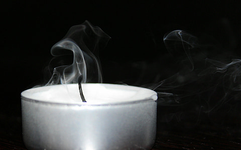 grayscale photography of candle thumbnail
