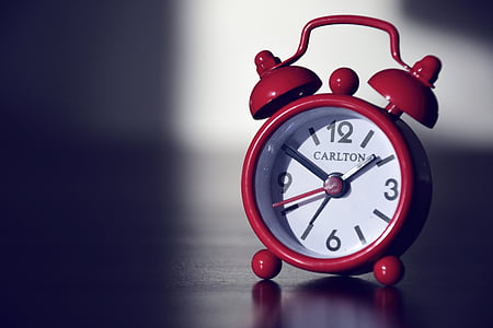 red twin bell alarm clock at 1:49 thumbnail