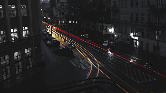 Time Lapse Photography of Car Headlight on Asphalt Road thumbnail