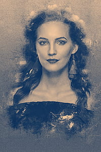 woman wearing tassel earrings portrait thumbnail