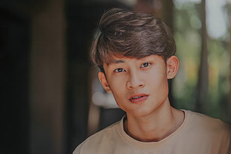 Selective-focus Photography of Man Wearing Beige Crew-neck Shirt thumbnail