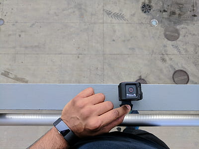 black activity camera on metal stand thumbnail