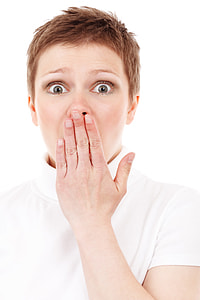 woman wearing white turtleneck t-shirt shocked emotion thumbnail
