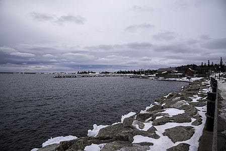 Rocks on the Lake Superior Shoreline in the winter in Grand Marais, Minnesota thumbnail