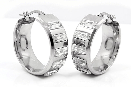 pair of silver-colored hoop earrings with clear gemstones thumbnail