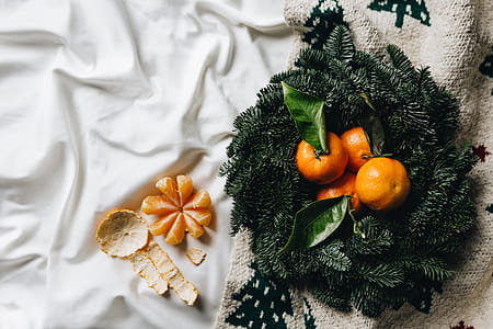 Still life of mandarin oranges with leaves thumbnail