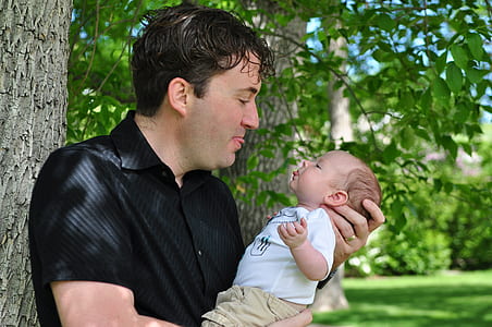 man in black button-up shirt thumbnail
