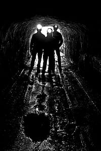silhouette of three person on cave with headlamp thumbnail