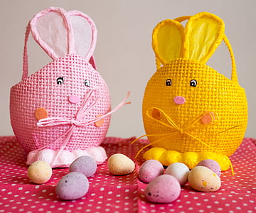 two yellow and pink wicker rabbit baskets with assorted-color pebbles thumbnail