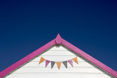low-angle photography of a-shape house roof thumbnail