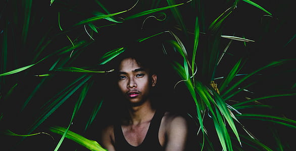 Man Wearing Black Tank Top thumbnail