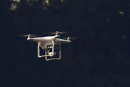 white quadcopter with camera thumbnail