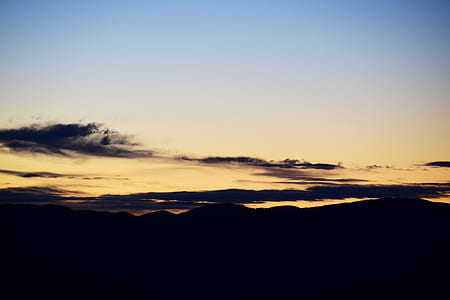 mountain silhouette during sunset thumbnail