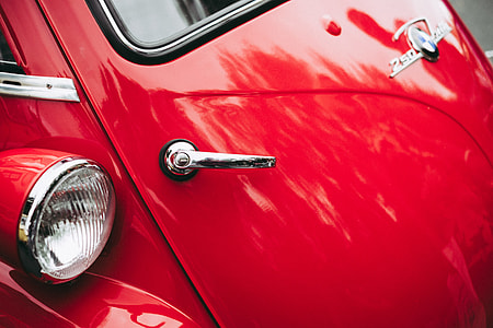 shallow focus photography of vintage red car thumbnail