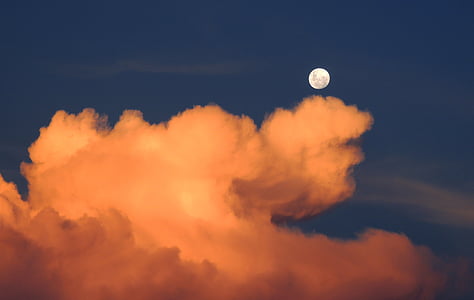 view of nimbus cumulus clouds with full moon thumbnail