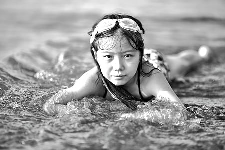 Girl Wearing Goggles on Beach in Black and White thumbnail