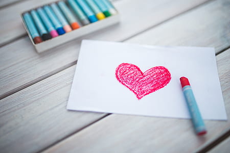 red heart drawing and red crayon thumbnail