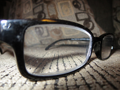 close up photo of black framed eyeglasses thumbnail
