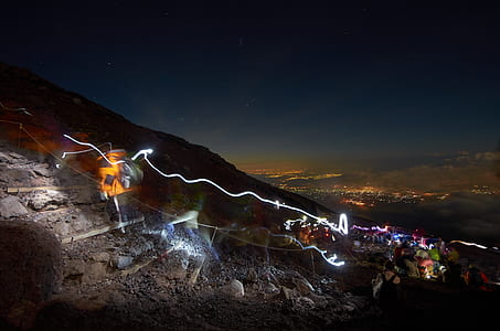 time lapse photography of lights on mountain thumbnail