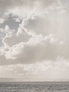 photo of white clouds and sea thumbnail
