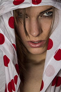 woman wearing white and red polka dot hoodie thumbnail