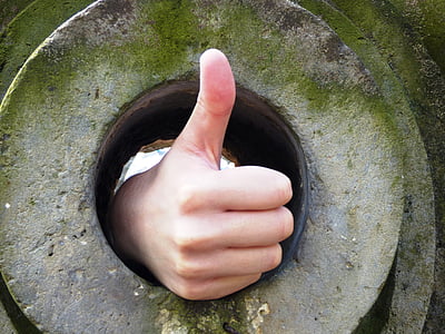 person's showing right thumb thumbnail