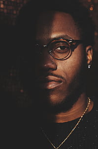 close up photo of man wearing eyeglasses thumbnail