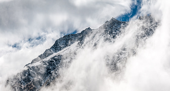 mountains covered by clouds thumbnail